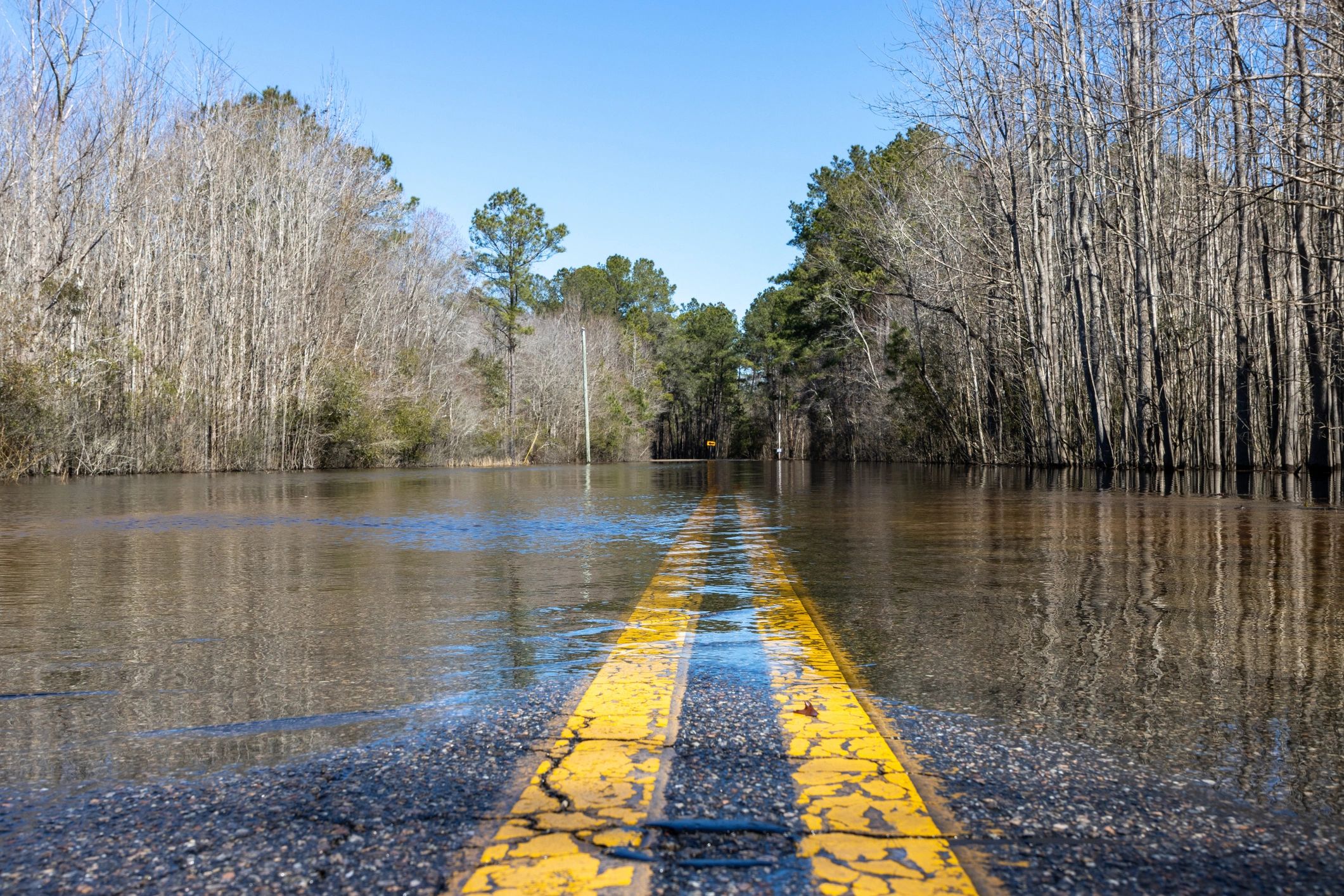 Flood water covering a roadway after heavy rain in Arizona
