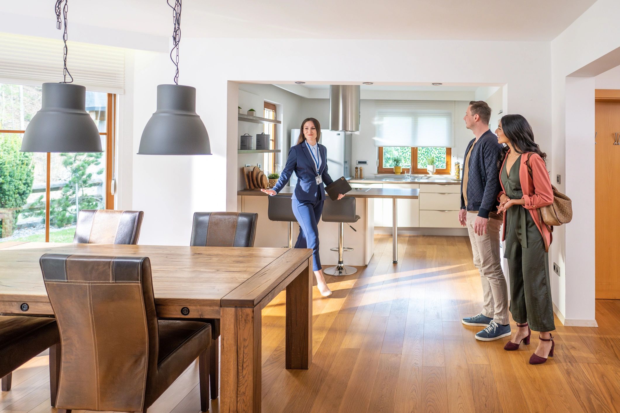 Homeowner meeting with a property professional during an in-home damage assessment