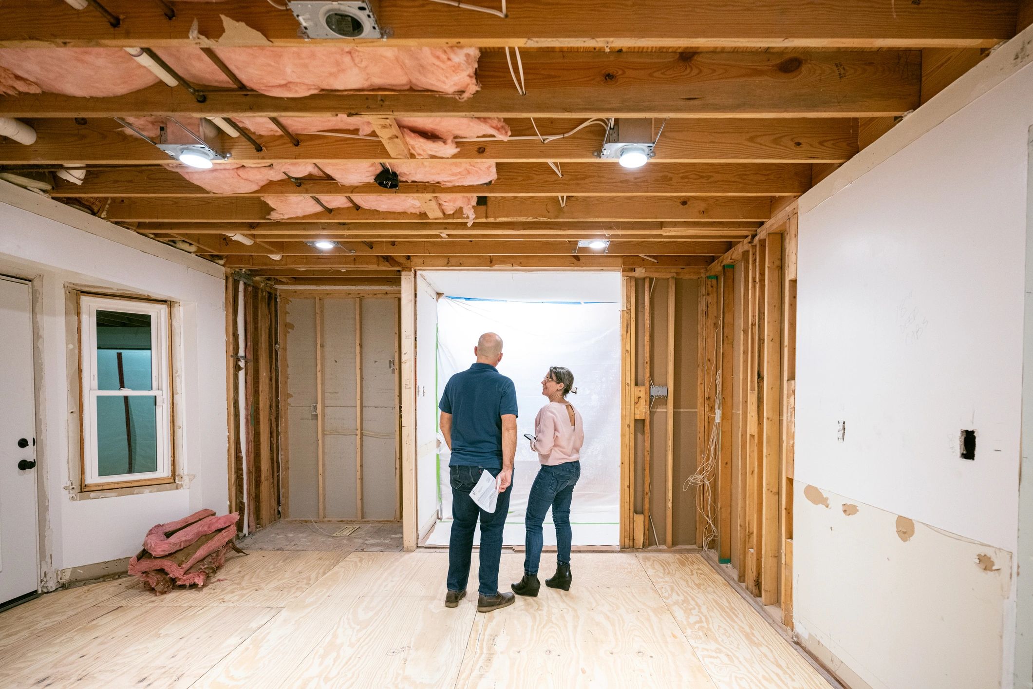 Arizona homeowners reviewing restoration-related insurance claim details