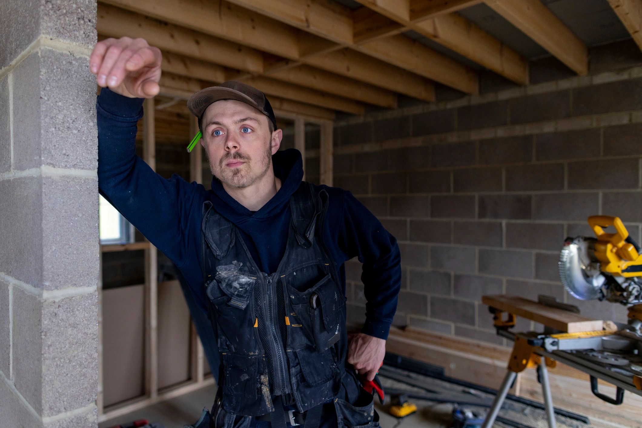 Restoration professional evaluating property conditions for mold-related repairs