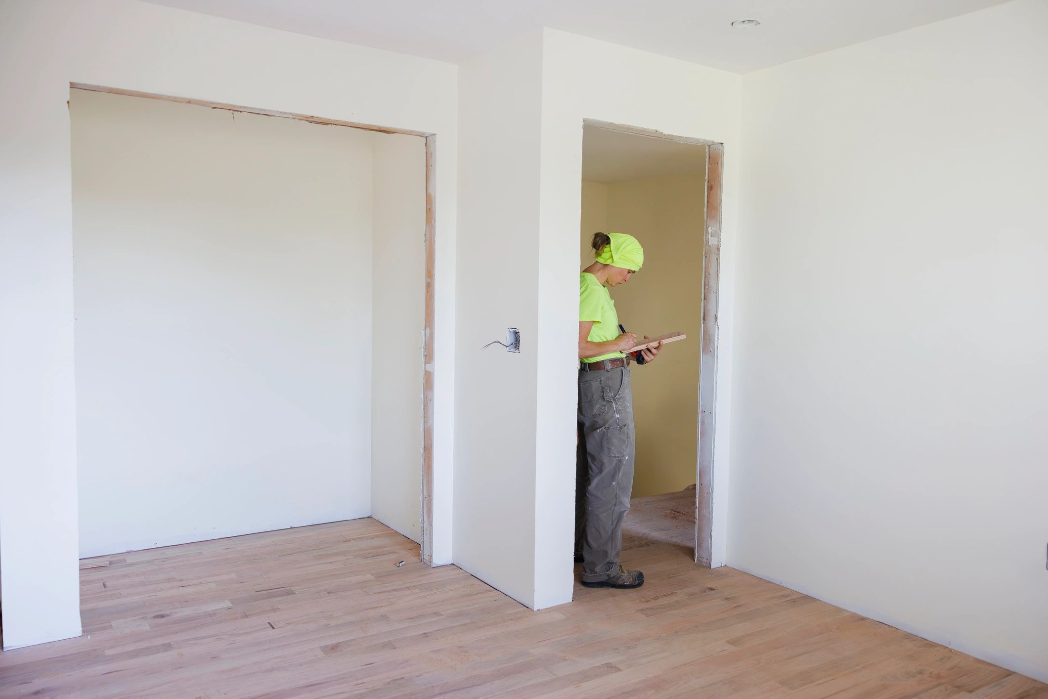 Contractor inspecting interior moisture-related damage in Gilbert home