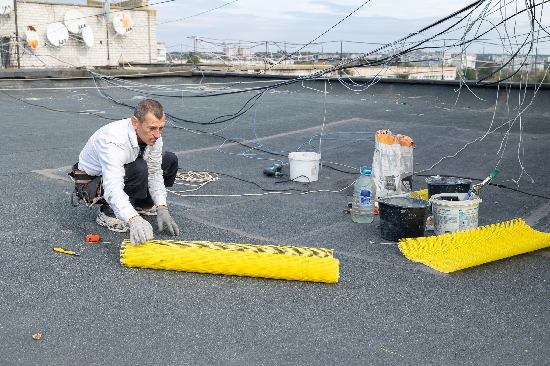 Arizona restoration crew preparing emergency roof protection